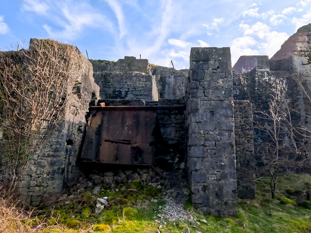 Passing by the disused limestone kilns at Storrs Quarry